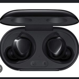 Samsung galaxy buds plus, black. In purple case with copper clip.